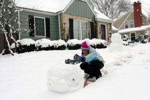 Gracie Xiao Lan's first time playing in the snow in America. Pure Joy! Taken Winter 2007.